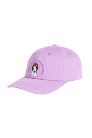 Lavender baseball cap with a dog graphic and the text Too Urban To Wilderness embroidered above it.