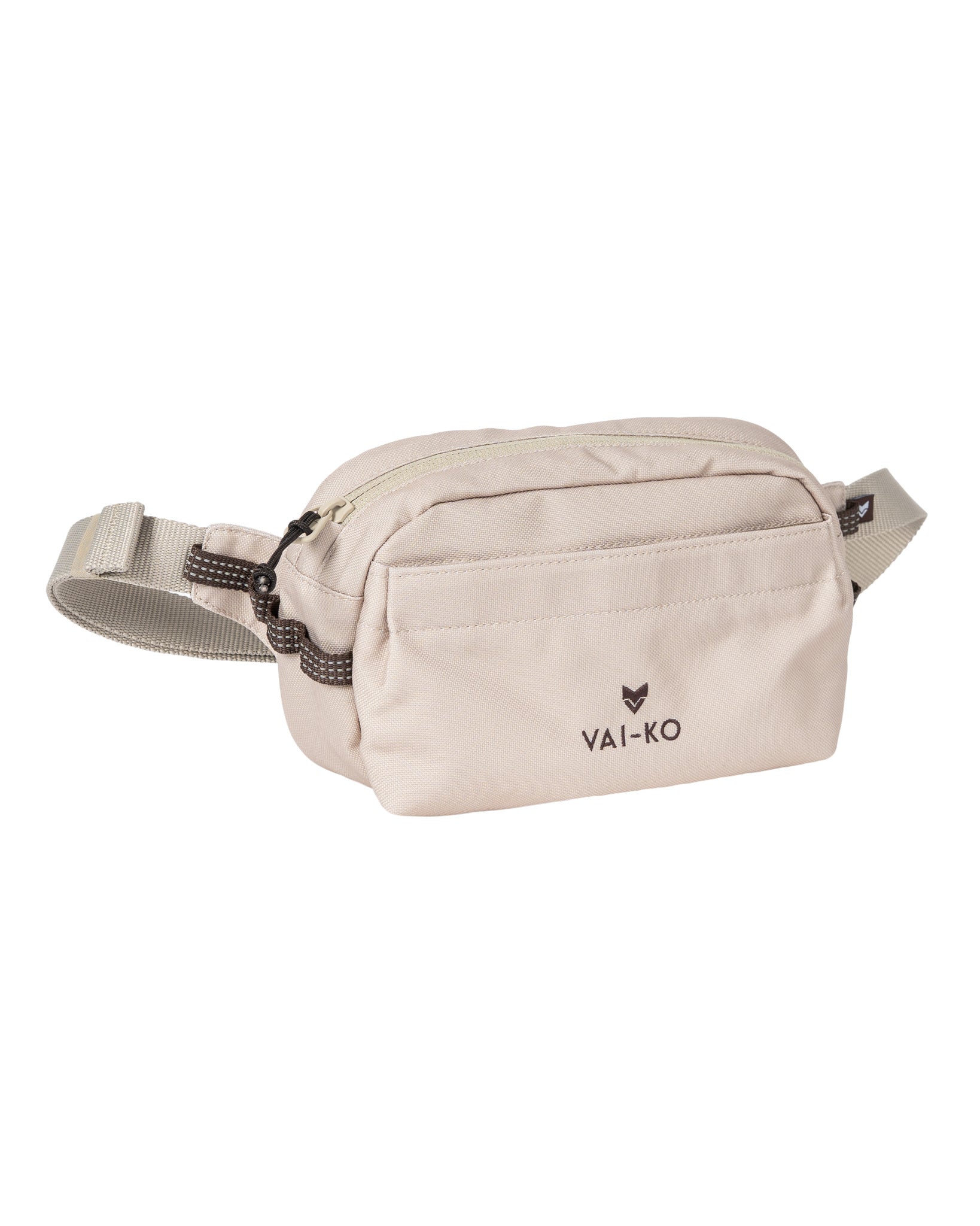 Beige Vai-Ko waist bag with front zipper pocket and adjustable strap, photographed on a white background.
