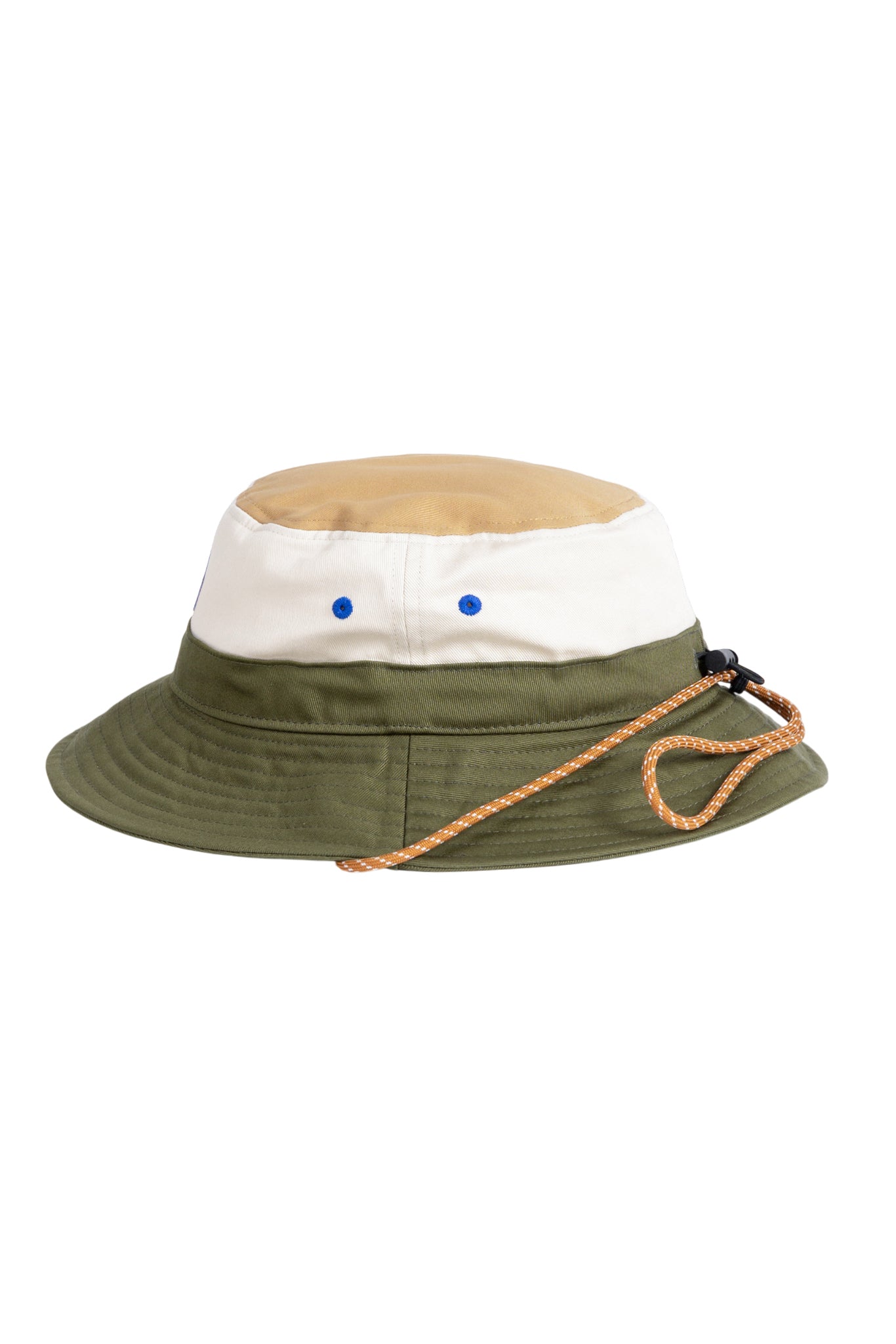 A colorblock bucket hat with tan, white, and green panels and an orange drawstring, on a white background.