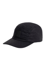 A plain black five-panel cap with a curved brim and a small rectangular patch on the front.