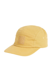 A yellow baseball cap with a square patch logo on the front.
