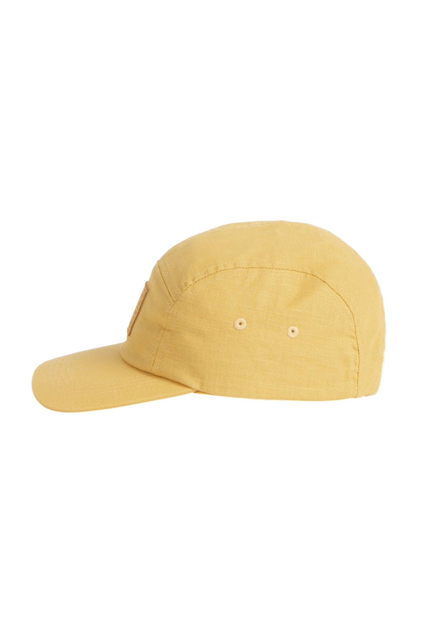 Yellow five-panel baseball cap with small ventilation holes, shown from the side on a white background.