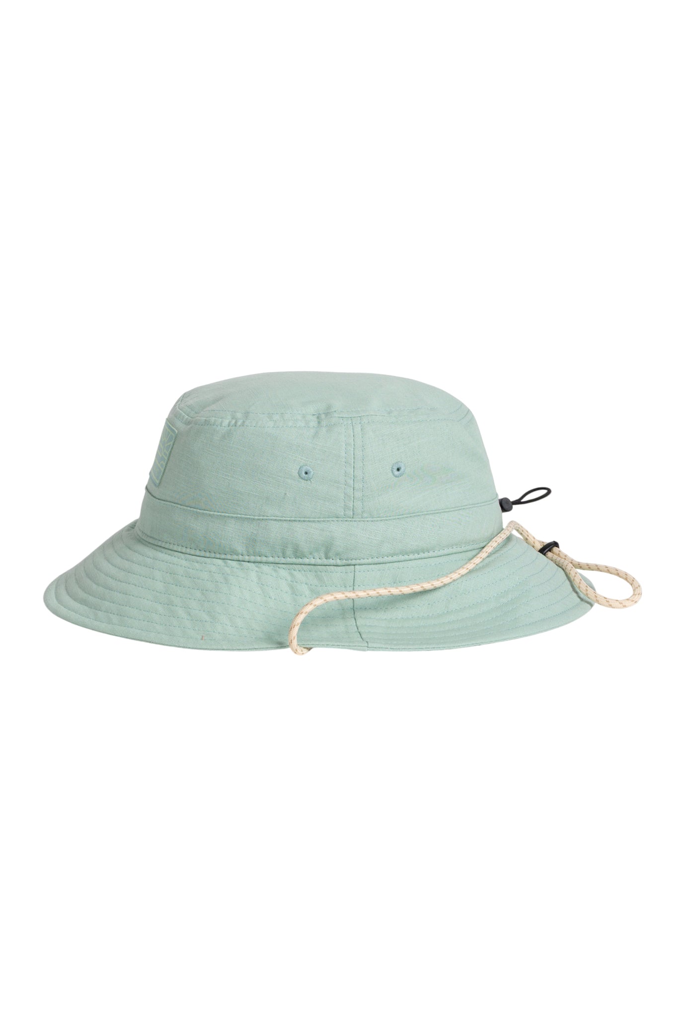 Light green bucket hat with a chin cord and side eyelets, photographed on a white background.