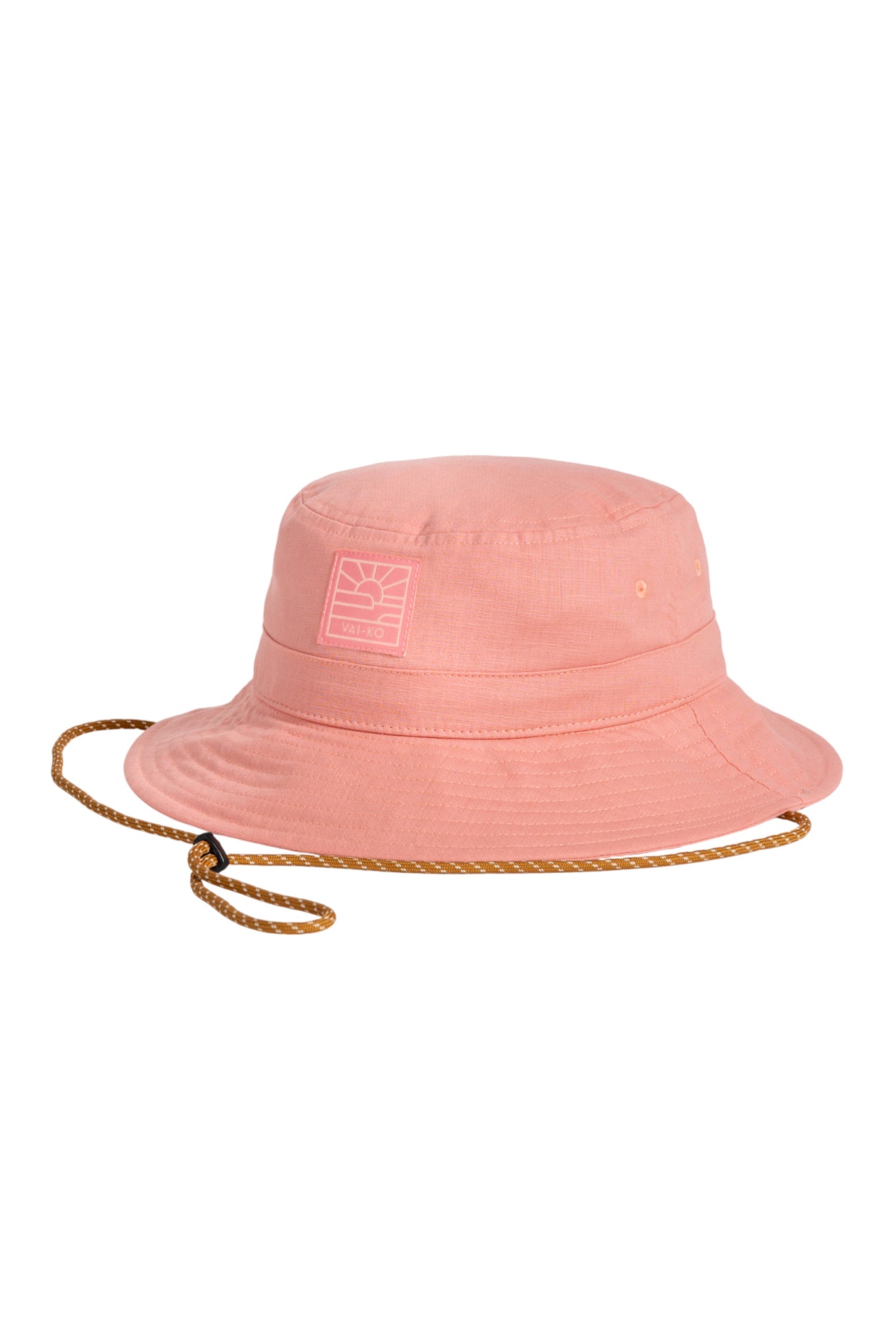 Peach-colored bucket hat with a chin strap and a small square logo patch on the front.