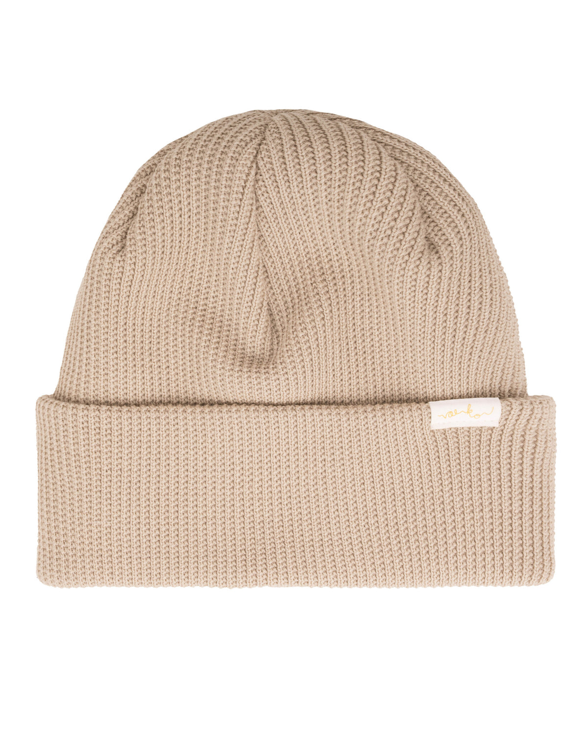 Beige knit beanie with a folded brim and a small white tag on the front.