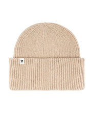 Beige knitted beanie with a folded brim and a small white tag featuring a minimal black logo on the side.