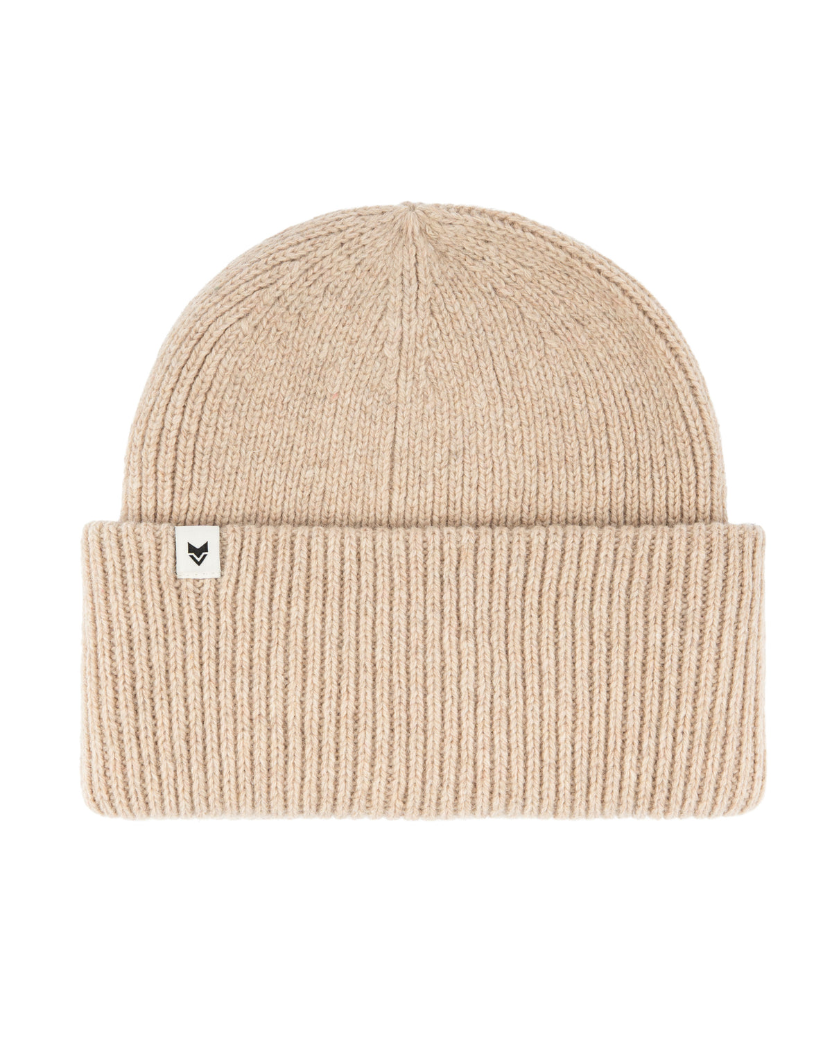 Beige knitted beanie with a folded brim and a small white tag featuring a minimal black logo on the side.