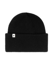 Black ribbed knit beanie with a folded brim and a small white tag featuring a simple black logo.