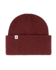 A ribbed maroon knit beanie with a folded brim and a small white tag on the front.