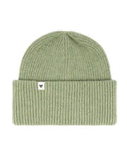 A light green ribbed knit beanie with a folded cuff and a small white tag on the front.