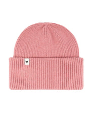 Pink knit beanie with a folded brim and a small white tag featuring a black symbol on the front.