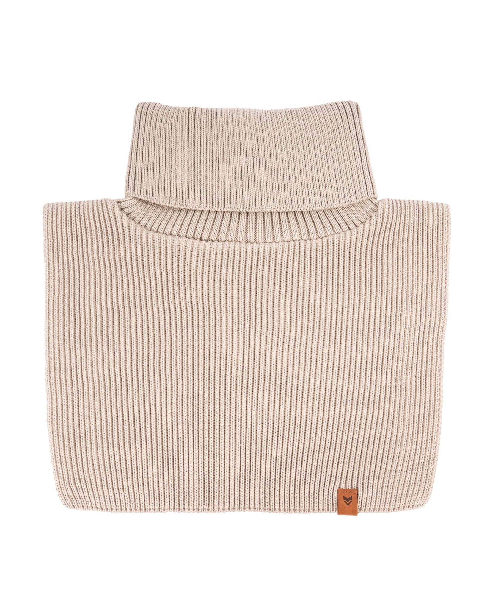 Beige ribbed knit turtleneck sweater neatly folded with a small brown tag in the corner.