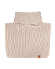 Beige ribbed knit turtleneck sweater neatly folded with a small brown tag in the corner.