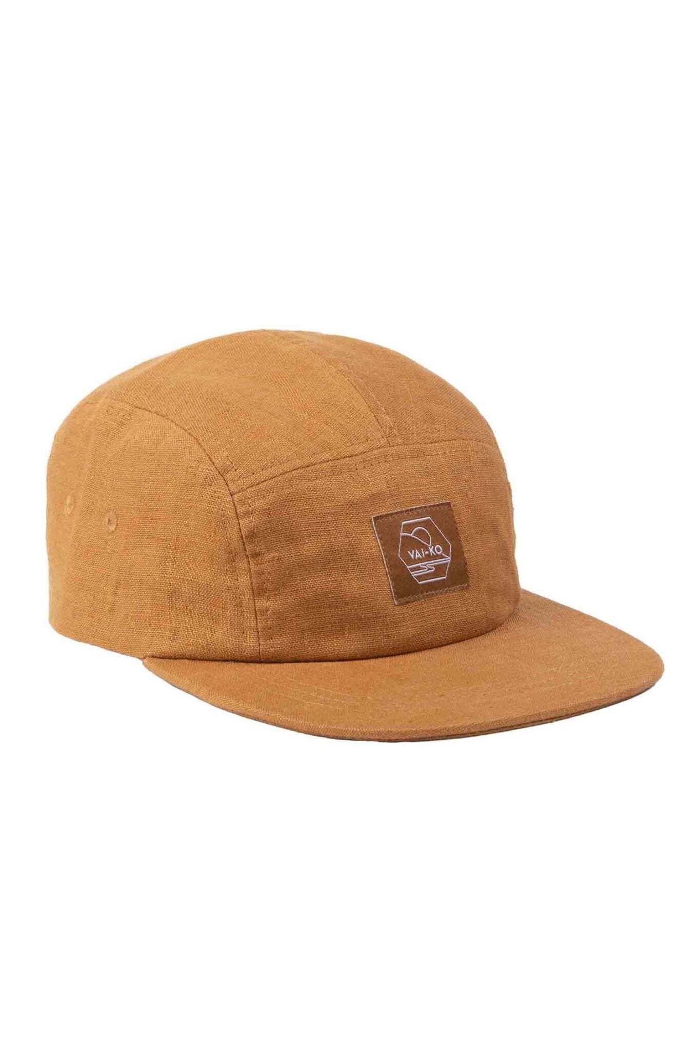 Brown five-panel cap with a flat brim and a rectangular patch logo on the front, shown on a white background.