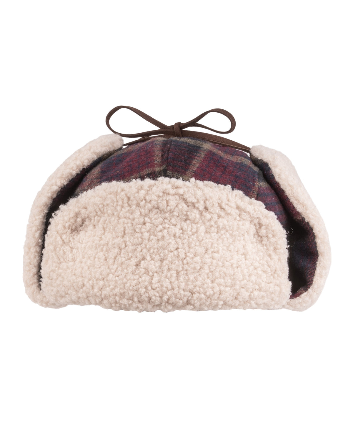 A plaid winter hat with ear flaps and white fleece lining, topped with a small brown bow.