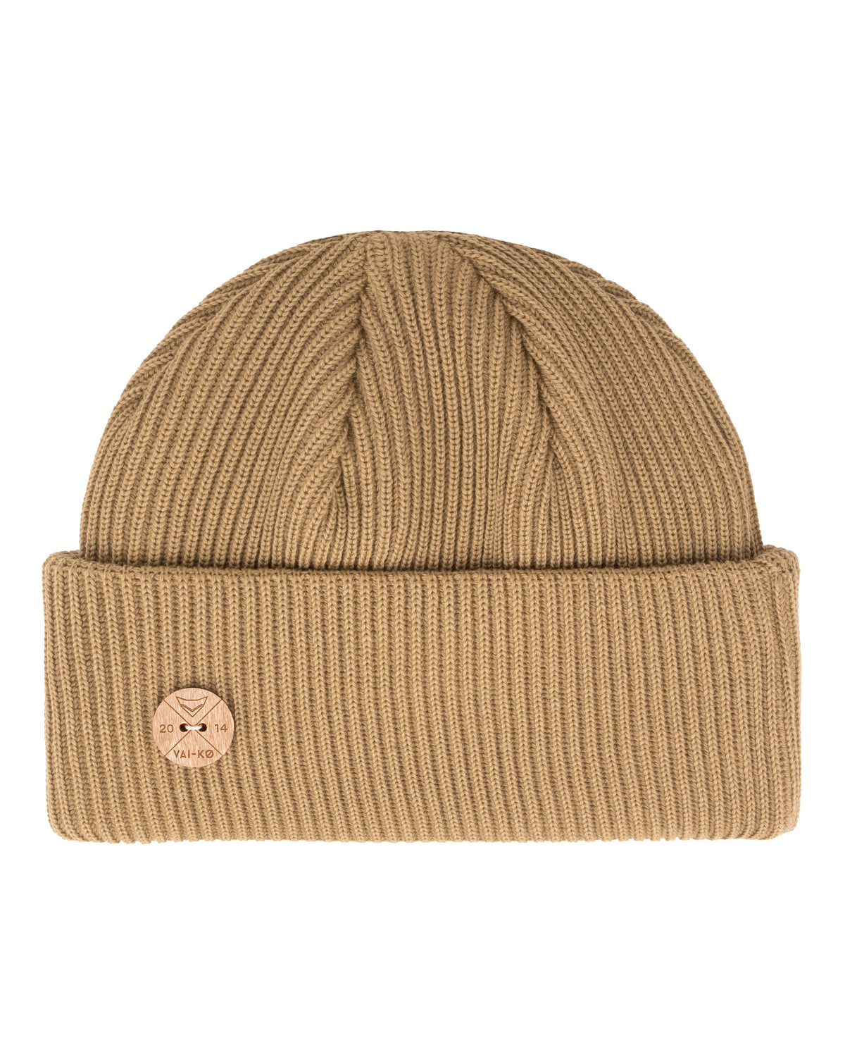 Tan ribbed knit beanie with a folded brim and a round leather patch on the front.