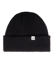 Black knit beanie with a folded brim and a small white tag featuring a simple black logo.